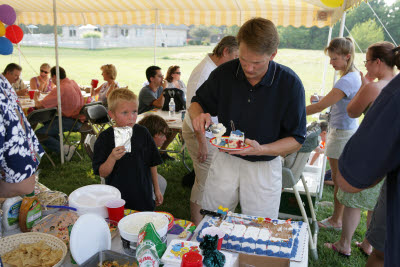Eric serving cake