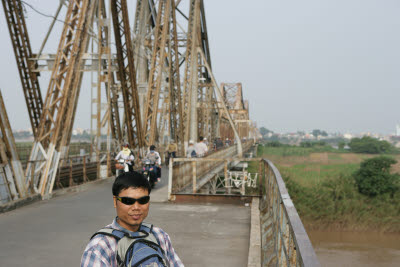 Our Guide Hung on the Long Bien Bridge
