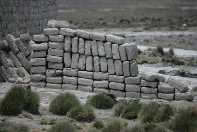 Pile of Sillar blocks made from white volcanic rock