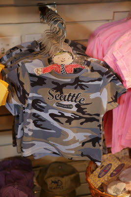 Trying on a Seattle T-Shirt