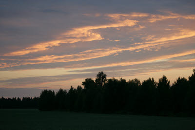 Setting sun lights the clouds