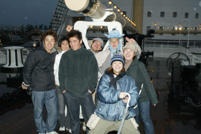 Locals on the deck of the Titanic at Disney Sea