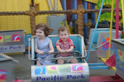 Katie and Cooper on a ride at Santa Monica pier.